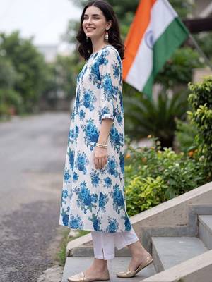 women floral printed regular cotton kurta with trousers 6