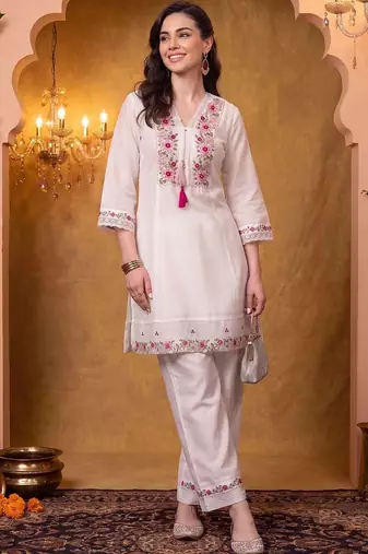 women floral embroidered regular thread work kurta with trousers