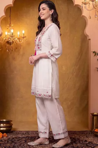 women floral embroidered regular thread work kurta with trousers