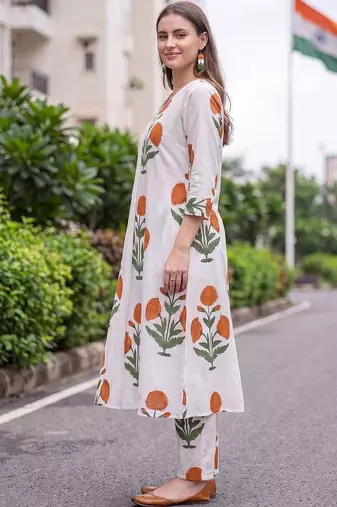 women floral printed regular cotton kurta with trousers
