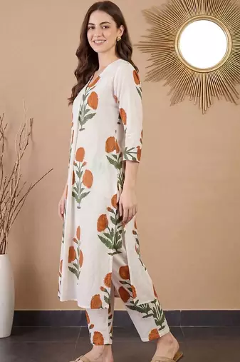 women floral printed regular cotton kurta with trousers