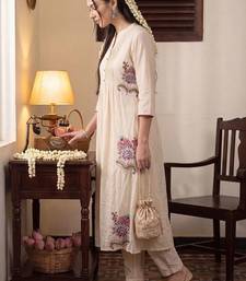 women floral embroidered empire thread work cotton kurta with trousers