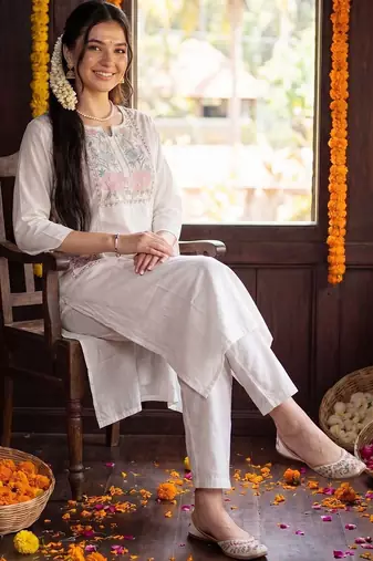 women floral embroidered regular thread work cotton kurta with trousers