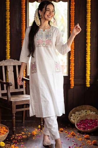 women floral embroidered regular thread work cotton kurta with trousers