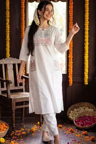 women floral embroidered regular thread work cotton kurta with trousers