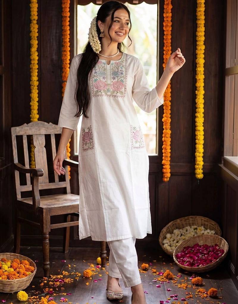 women floral embroidered regular thread work cotton kurta with trousers