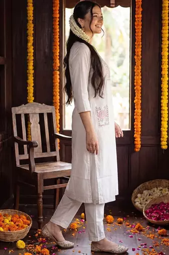 women floral embroidered regular thread work cotton kurta with trousers