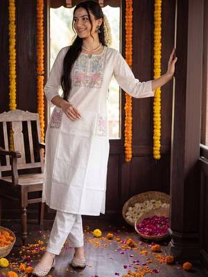 women floral embroidered regular thread work cotton kurta with trousers 6