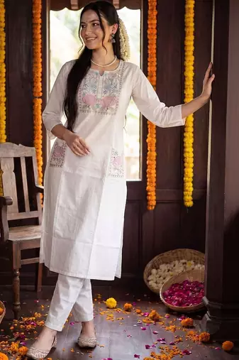 women floral embroidered regular thread work cotton kurta with trousers