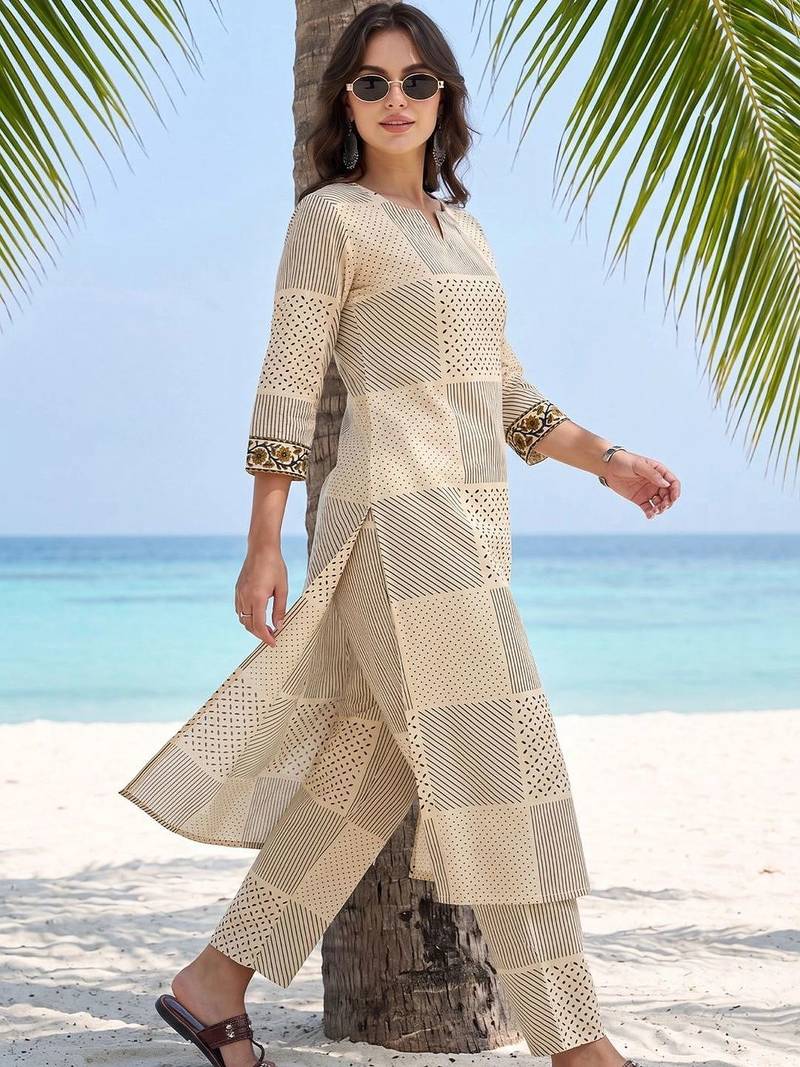 women printed regular cotton kurta with trousers
