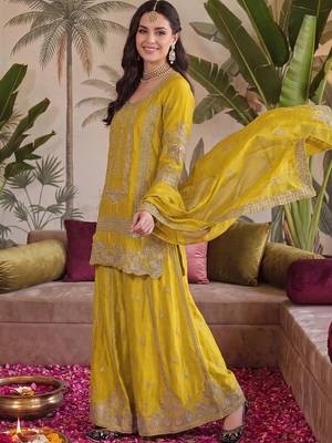 women ethnic motifs embroidered regular kurta with sharara & with dupatta 1