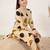 women printed regular cotton kurta with trousers