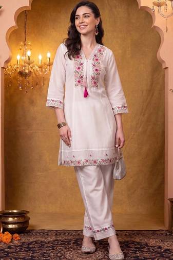 women floral embroidered regular thread work kurta with trousers