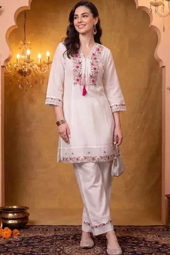 women floral embroidered regular thread work kurta with trousers