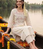 women floral embroidered regular sequinned cotton kurta with trousers