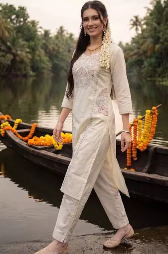 women floral embroidered regular sequinned cotton kurta with trousers