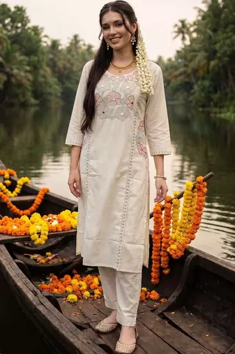 women floral embroidered regular sequinned cotton kurta with trousers