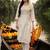 women floral embroidered regular sequinned cotton kurta with trousers
