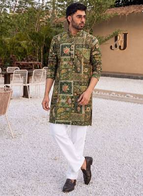 Elegant green heavy crepe kurta set with thread & sequin embroidery 1