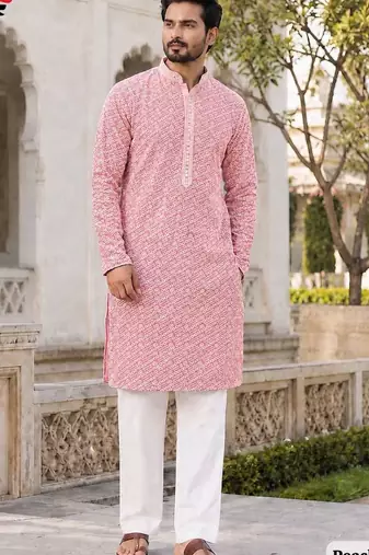 Graceful light peach rayon kurta set with chikankari schiffli work