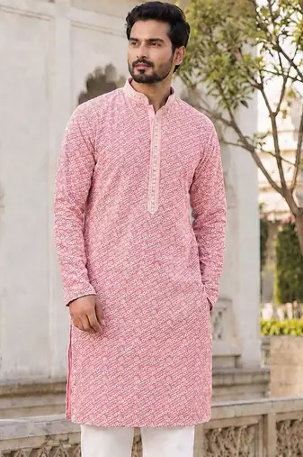 Graceful light peach rayon kurta set with chikankari schiffli work