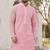 Graceful light peach rayon kurta set with chikankari schiffli work