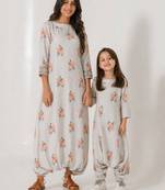 Pista green abstract & floral printed cotton dhoti jumpsuit mother daughter matching combo