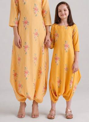 Yellow & amber yellow floral printed rayon jumpsuit & dhoti jumpsuit mother daughter matching combo 1