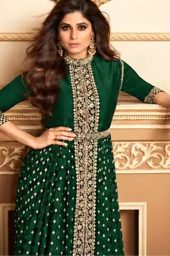 Dark  green georgette semi stitched suit with embroidery & stone work
