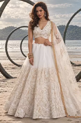 WHITE NET THREAD WITH ZARI AND SEQUIN WORK FESTIVE LEHENGA CHOLI