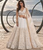 WHITE NET THREAD WITH ZARI AND SEQUIN WORK FESTIVE LEHENGA CHOLI