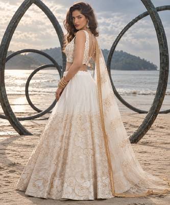 WHITE NET THREAD WITH ZARI AND SEQUIN WORK FESTIVE LEHENGA CHOLI 3