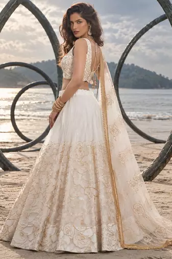 WHITE NET THREAD WITH ZARI AND SEQUIN WORK FESTIVE LEHENGA CHOLI