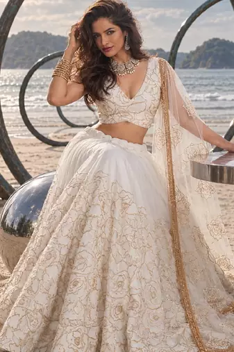 WHITE NET THREAD WITH ZARI AND SEQUIN WORK FESTIVE LEHENGA CHOLI