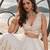 WHITE NET THREAD WITH ZARI AND SEQUIN WORK FESTIVE LEHENGA CHOLI