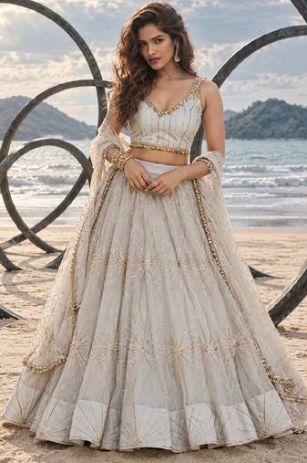 WHITE NET THREAD WITH ZARI AND SEQUIN WORK FESTIVE LEHENGA CHOLI
