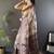 Brown woven design zari silk blend saree