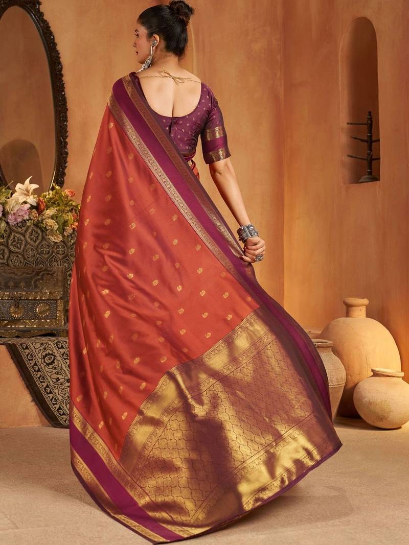 Rust woven design silk blend designer kanjeevaram saree