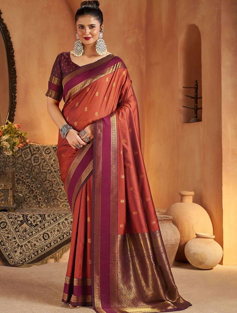 Rust woven design silk blend designer kanjeevaram saree