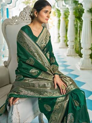 Green woven design zari silk blend designer kanjeevaram saree 1