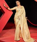 White ethnic motifs woven design zari saree