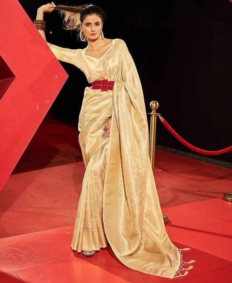 White ethnic motifs woven design zari saree