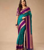 Green woven design silk blend designer kanjeevaram saree