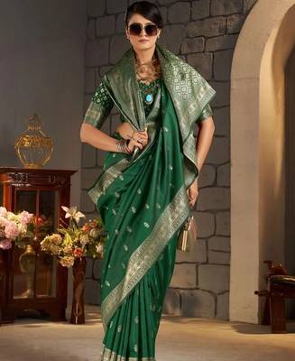 Green woven design zari silk blend designer banarasi saree 1