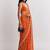 Orange ethnic motifs embroidered satin heavy work saree
