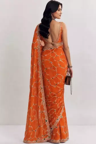 Orange ethnic motifs embroidered satin heavy work saree