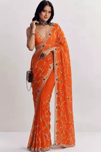 Orange ethnic motifs embroidered satin heavy work saree