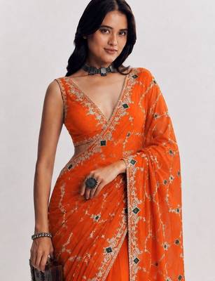 Orange ethnic motifs embroidered satin heavy work saree 4