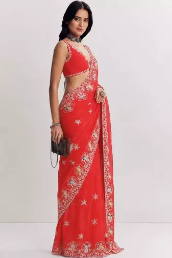 Red ethnic motifs embroidered satin heavy work saree