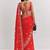 Red ethnic motifs embroidered satin heavy work saree